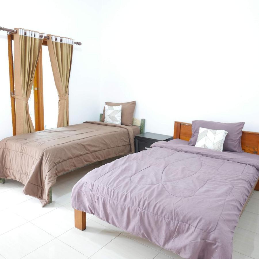 דירות גילי טרוונגן Rumah Side מראה חיצוני תמונה